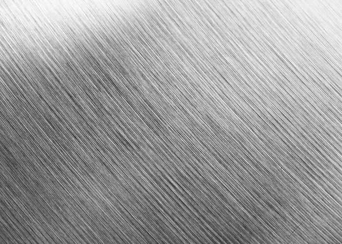 Metall gravieren lassen – Hochwertige Lasergravur auf gebürstetem Stahl in Hannover